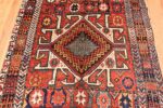 Close-up Colorful Eagle Kazak design Antique Tribal Persian Kurdish rug 47471 by Nazmiyal