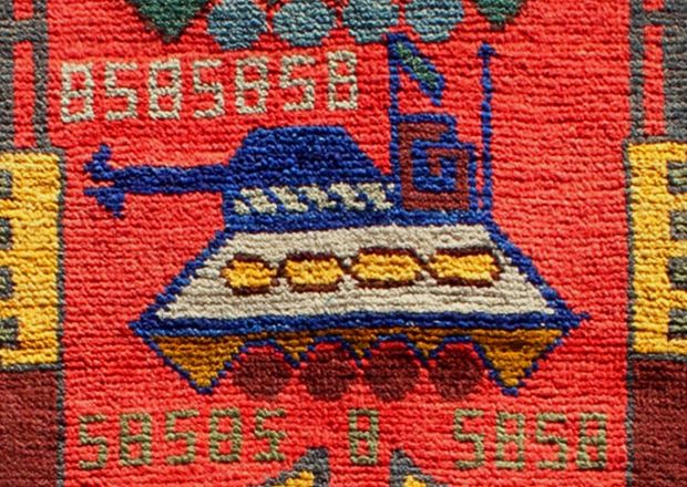 Oriental War Rug Image of a tank woven into a modern Middle Eastern Oriental War Rugs