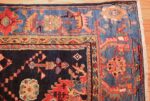 colorful antique persian bakhtiari rug 48728 corner Nazmiyal
