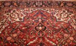 colorful antique persian heriz rug 48727 top Nazmiyal