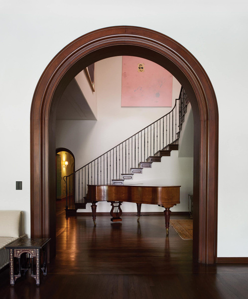 Staircase in the Santa Monica home, with a view of the grand piano. Shane-Smith-main-staircase