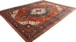 antique red background sarouk farahan persian rug 51095 side Nazmiyal