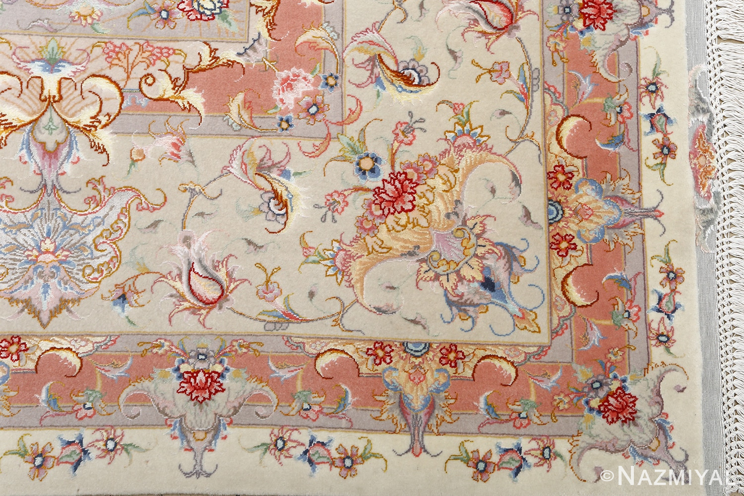 fine ivory background vintage tabriz persian rug 51072 corner Nazmiyal