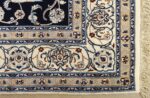 animal motif vintage nain persian rug 51164 corner Nazmiyal