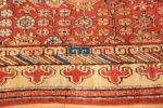 small antique red background khotan rug 49033 border Nazmiyal
