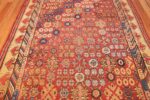small antique red background khotan rug 49033 field Nazmiyal