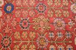 small antique red background khotan rug 49033 flowers Nazmiyal