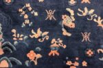 round antique navy background chinese rug 49593 closeup Nazmiyal