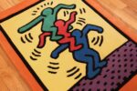small size vintage american rug designed by keith haring 49660 side Nazmiyal