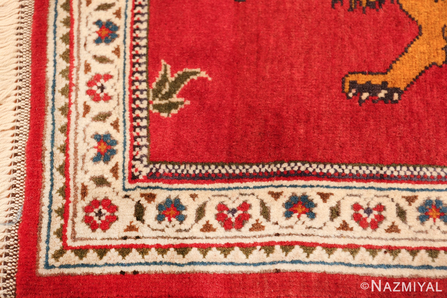 vintage lion designed tabriz persian rug 49625 corner Nazmiyal