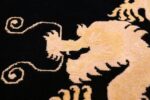 benevolent five clawed dragon design black antique chinese rug 49669 closeup Nazmiyal