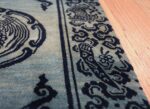 Antique Blue Background Tibetan Rug 49795 border knife Nazmiyal