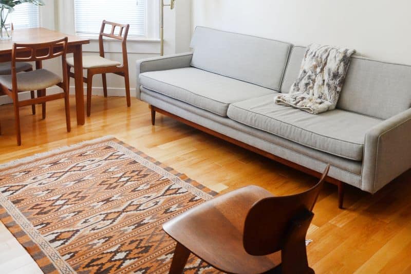 Vintage Rug Grey Couch Nazmiyal