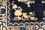 Image of Corner of Small Antique Peking Foo Dog Chinese Rug #70039 from the collection of Nazmiyal Antique Rugs NYC