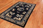 Image of Small Antique Peking Foo Dog Chinese Rug #70039 from the collection of Nazmiyal Antique Rugs NYC