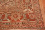 A picture of the corner of Antique Ivory Persian Sultanabad rug #50576 from Nazmiyal Antique Rugs in NYC