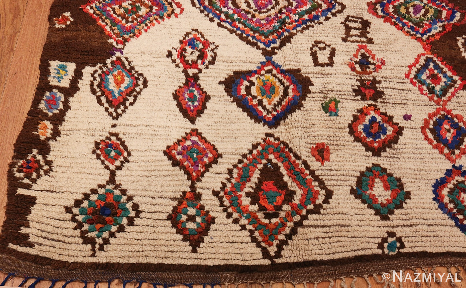 Picture of the Corner of Vintage Mid Century Folk Art Moroccan Rug #46512 From Nazmiyal Antique Rugs In NYC