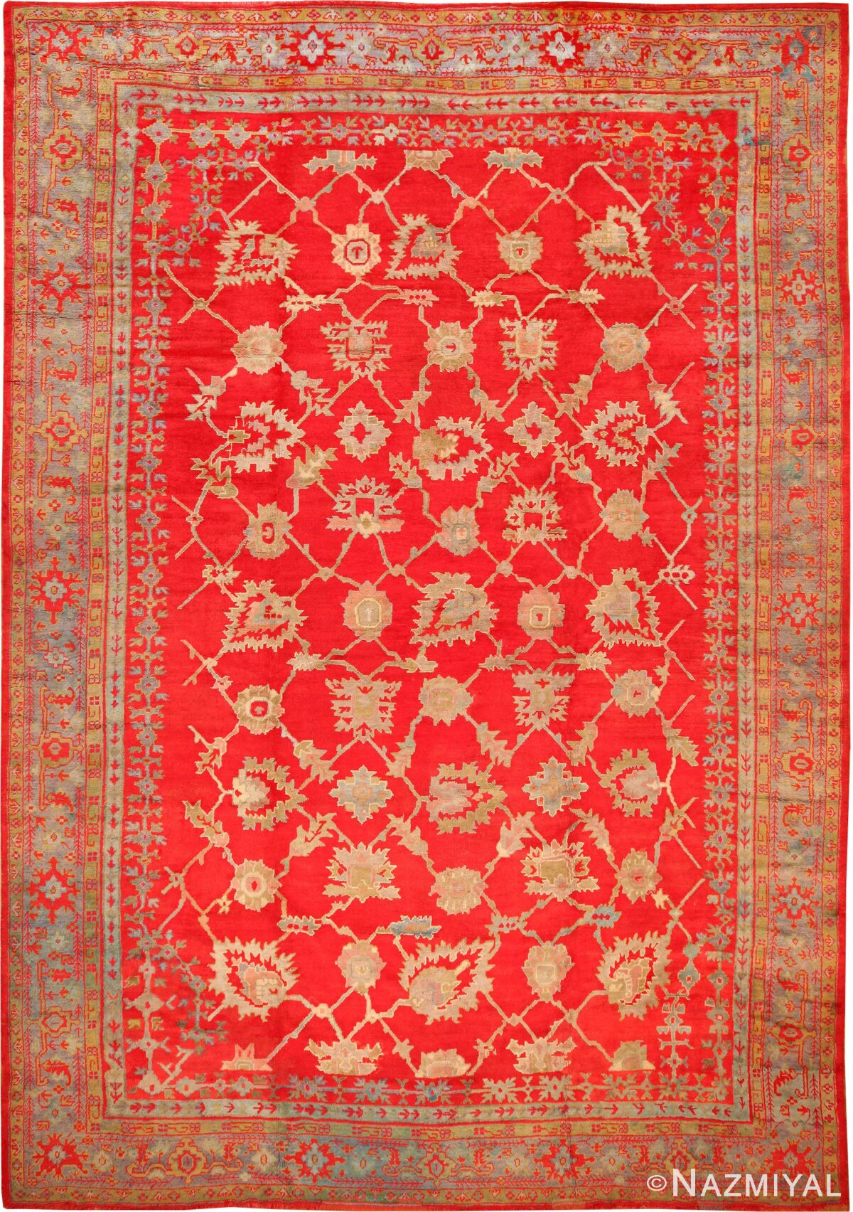 Picture of the Large Size All Over Design Rich Red Color Background Antique Turkish Oushak Rug #70012 from Nazmiyal Antique Rugs in NYC.
