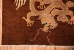 A detailed dragon piture of the antique chinese dragon runner rug #70064 from Nazmiyal Antique Rugs NYC