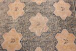 A detailed flower pattern picture of the rare antique 17th century chinese ningxia carpet #70071 from Nazmiyal Antique Rugs NYC