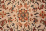 A detailed red flower picture of the large ivory background antique persian sultanabad rug #50571 from Nazmiyal Antique Rugs NYC