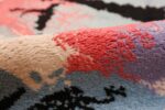 A pile picture of the vintage Swedish Robert Jacobsen Ege Rug #7077 from Nazmiyal Antique Rugs NYC