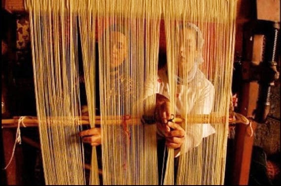 Rug Weavers rug weavers hand making rugs