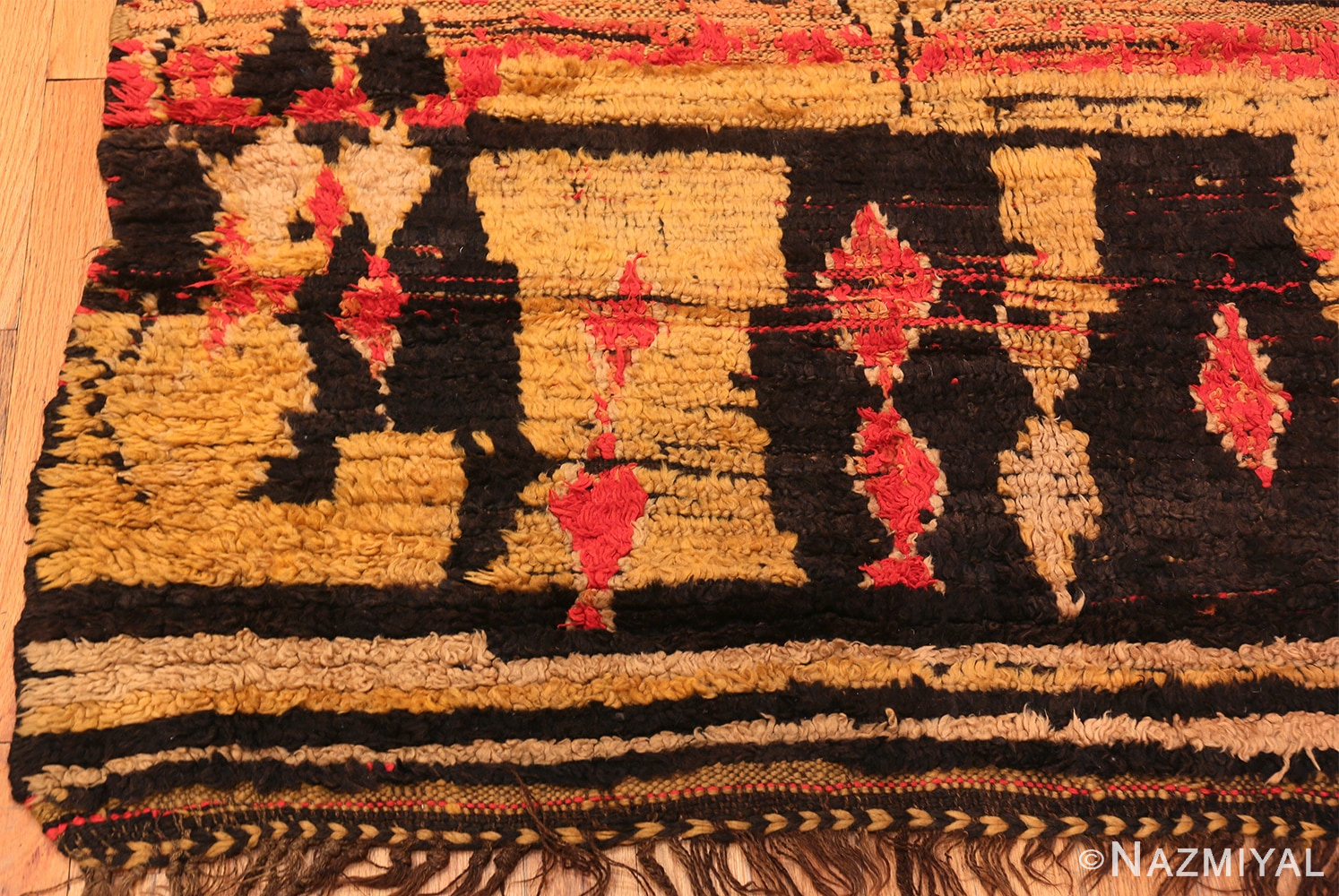 Corner Of Primitive Vintage Moroccan Rug 70569 by Nazmiyal NYC