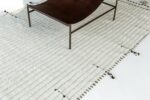 Side View Of Solid Ivory Modern Boho Chic Rug 60677 by Nazmiyal Antique Rugs