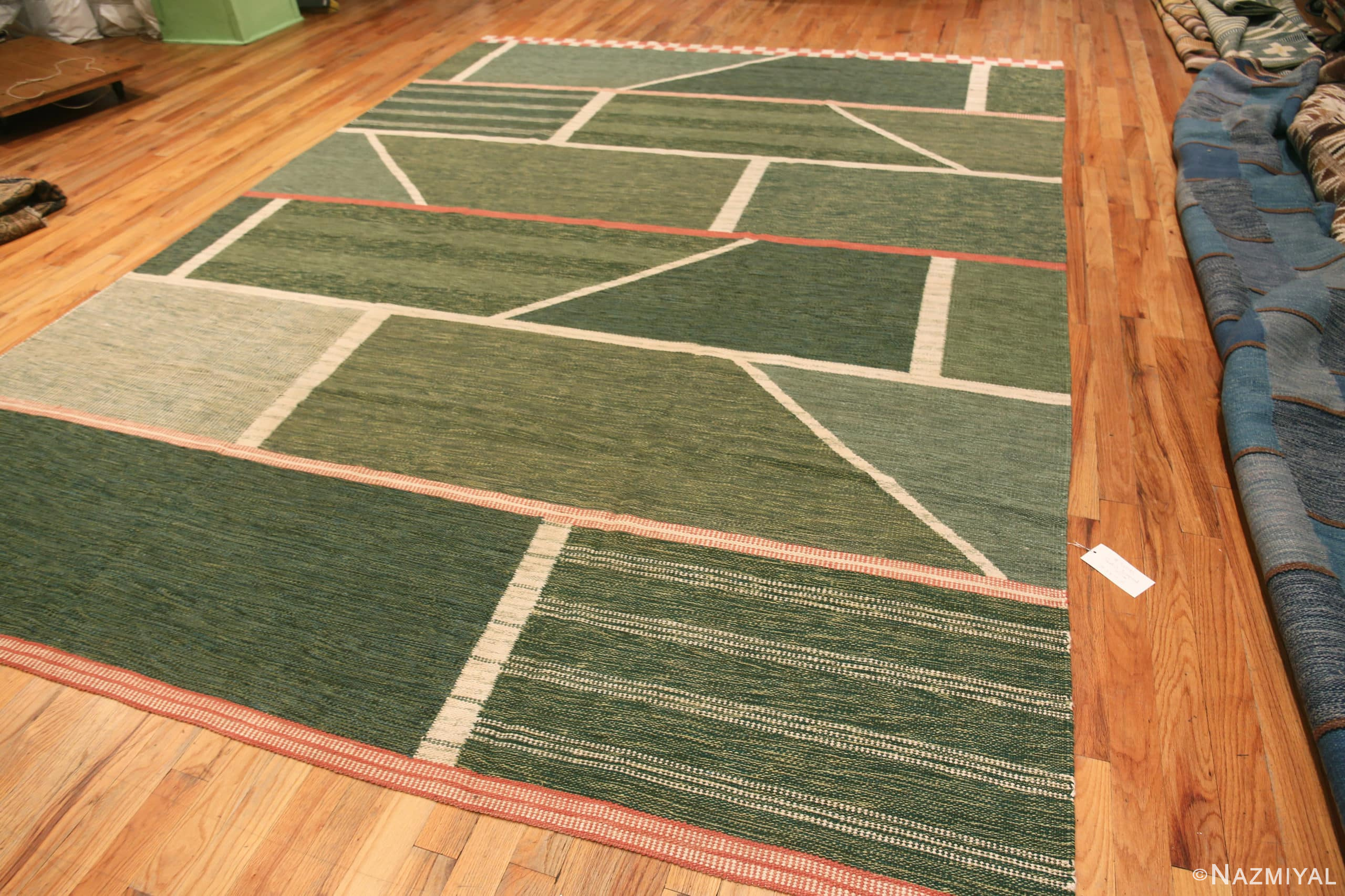 Scandinavian Scatter Rug with Green Geometric Patterns