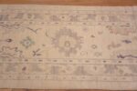 Border of Soft Ivory Cream Background Pastel Color Tribal Geometric Turkish Oushak Design Modern Hallway Runner Rug 11194 by Nazmiyal Antique Rugs