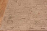Corner of A facinating earthy cream neutral abstract modern Turkish Oushak design area rug 11337 by Nazmiyal Antique Rugs