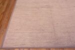 Corner of A Decorative Light Cream Color Soft Coral Abrash Solid Abstract Modern Room Size Rug 11531 by Nazmiyal Antique Rugs