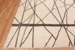 Corner of Decorative and Artistic Modern Contemporary Ivory Color Geometric Design Room Size Area Rug 11486 by Nazmiyal Antique Rugs