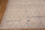 Corner of Beautiful Modern Cream Background With Light Blue Artistic Primitive Tribal Geometric Design Room Size Area Rug 11575 by Nazmiyal Antique Rugs