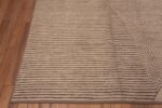 Corner of A Modern Decorative Cream Color Artistic Room Size Contemporary Area Rug 11348 by Nazmiyal Antique Rugs