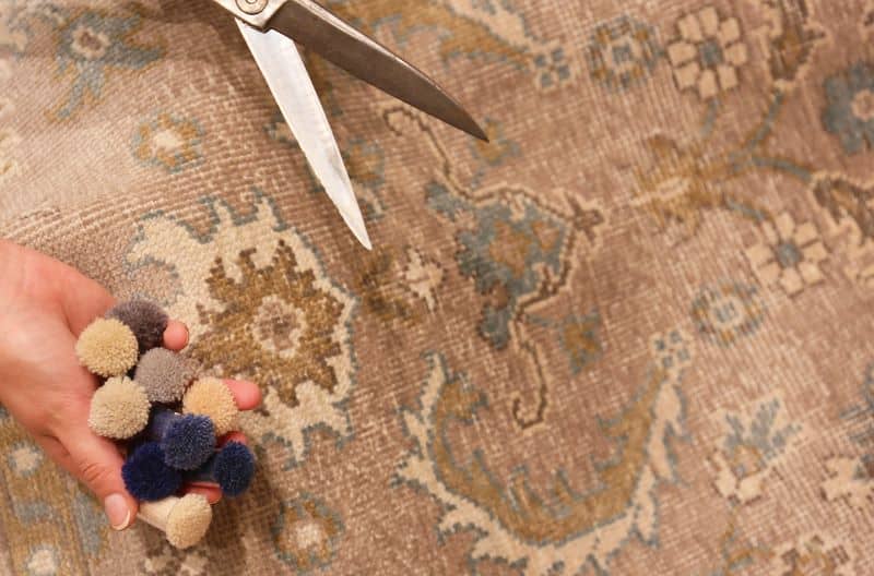 Picking colors for bespoke rugs using color poms and strike-offs
