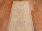 Top of Warm Decorative Neutral Grey Background Color Tribal Design Modern Turkish Oushak Design Hallway Runner Rug 11193 by Nazmiyal Antique Rugs
