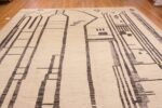 Top of Ivory Background Abstract Primitive Design Modern Area Rug 11727 by Nazmiyal Antique Rugs
