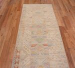 Top of Light Cream And Pastel Color Tribal Geometric Design Modern Contemporary Hallway Runner Rug 11053 by Nazmiyal Antique Rugs