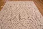 Top of Captivating and Decorative Modern Ivory Cream Tribal Geometric Moroccan Beni Ourain Design Rug 11485 by Nazmiyal Antique Rugs