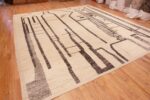 Whole View of Ivory Background Abstract Primitive Design Modern Area Rug 11727 by Nazmiyal Antique Rugs