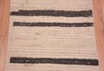 Close Up of Minimalist Primitive Pattern Cream and Charcoal Color Modern Hallway Runner Rug 11881 by Nazmiyal Antique rugs