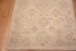 Corner of Light Cream Ivory Color Background and Soft Rustic Tribal Pattern Modern Hallway Runner Rug 11049 by Nazmiyal Antique rugs