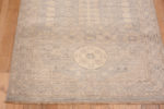 Corner of Light Neutral Grey Color Khotan Pomegranate Design Modern Hallway Runner Rug 11212 by Nazmiyal Antique rugs