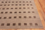 Corner of Neutral Minimalist Background With Brown Geometric Squares Design Pattern Modern Area Rug 11636 by Nazmiyal Antique Rugs