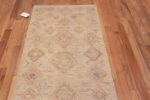Top of Light Cream Ivory Color Background and Soft Rustic Tribal Pattern Modern Hallway Runner Rug 11049 by Nazmiyal Antique rugs