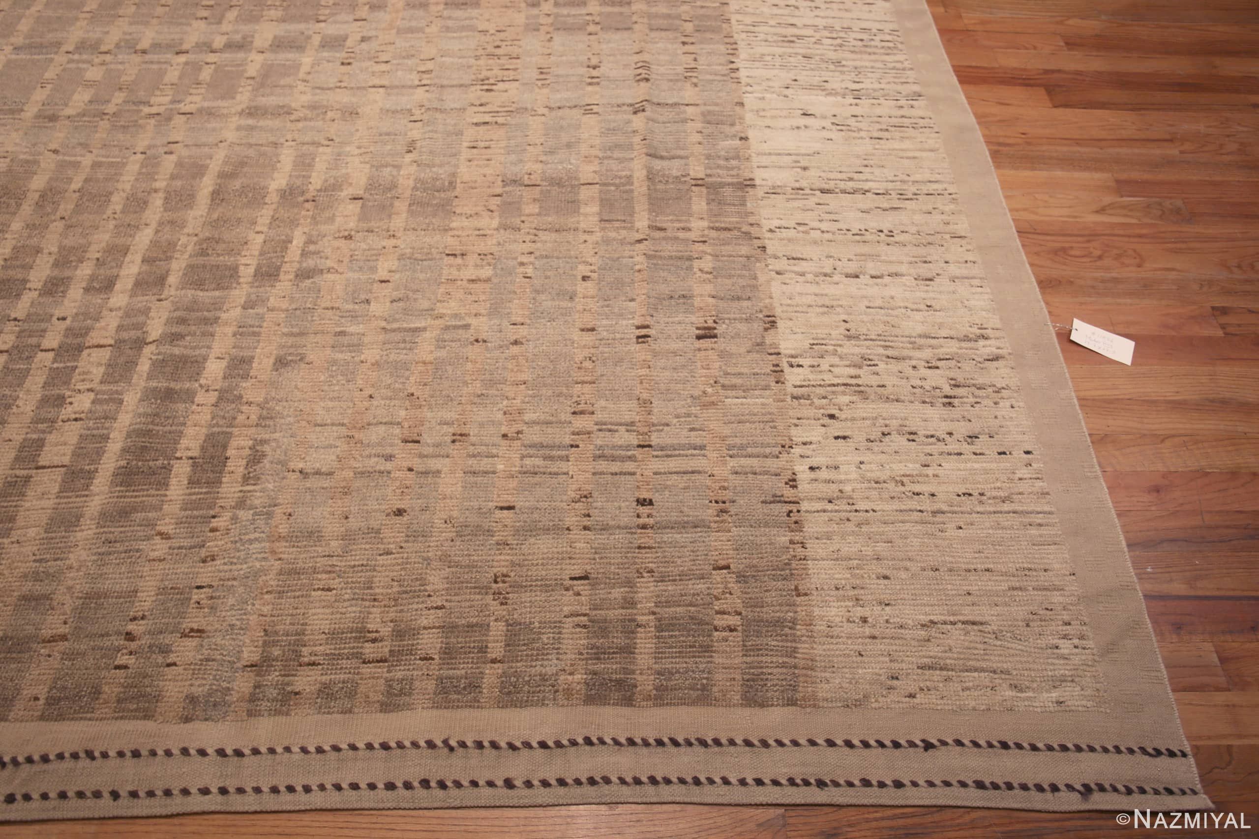 Corner of Oversized Light Neutral Earthy Color Tribal Geometric Nomadic Design Modern Area Rug 11856 by Nazmiyal Antique Rugs