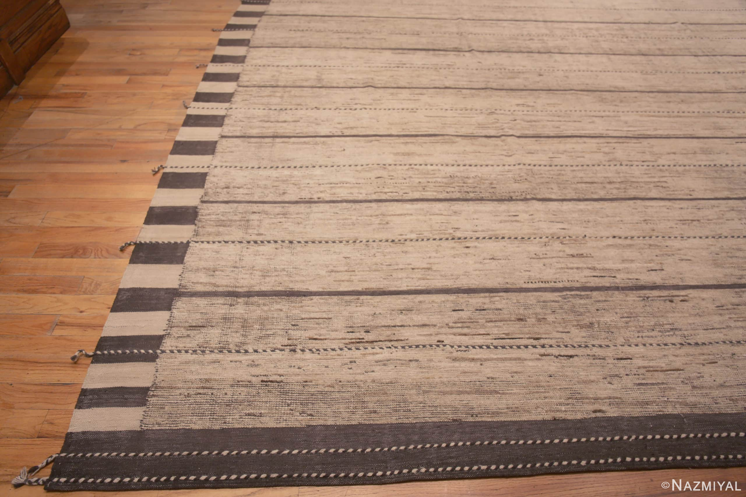 Corner of Oversized Neutral Cream Color Minimalist Geometric Stripes Design Modern Area Rug 11864 by Nazmiyal Antique Rugs