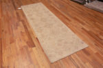 Whole View of Light Cream Ivory Color Background and Soft Rustic Tribal Pattern Modern Hallway Runner Rug 11049 by Nazmiyal Antique rugs